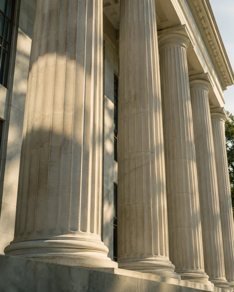 Sunlit limestone columns in the Hart and Co website concept